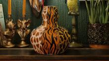 Picture of a pot upcycled with different animal print patterns