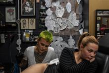 Lauren Houlihan tattooing in her studio