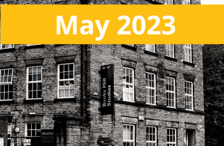 A picture of the Banks Mill building with the text May 2023