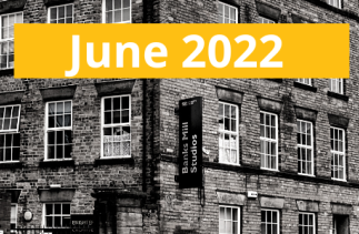 A picture of the Banks Mill Building with the text June 2022